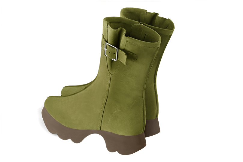 Pistachio green women's ankle boots with a zip on the inside. Round toe. Low rubber soles. Rear view - Florence KOOIJMAN